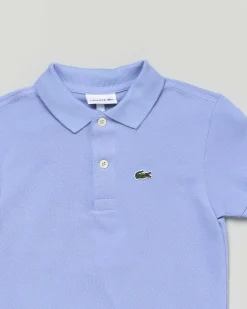 Polo Lacoste celeste piqué di puro cotone