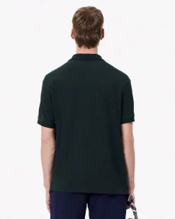 Polo Lacoste verde scuro classic fit L.12.12 in petit piqué