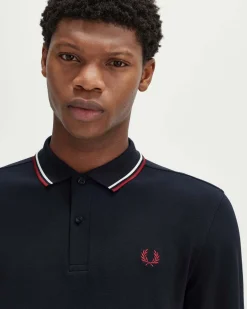 Polo manica lunga Fred Perry blu con bordino bianco e rosso