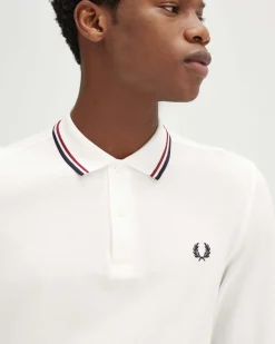 Polo manica lunga Fred Perry bianca con bordino blu e rosso