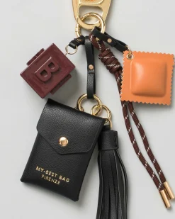 Portachiavi My Best Bag con charms a bustina nera e dado smaltato marrone con logo a rilievo
