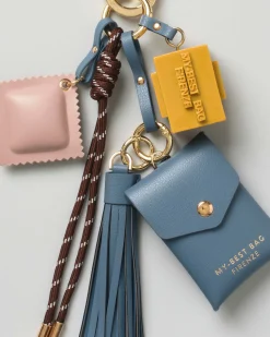 Portachiavi My Best Bag con charms a bustina azzurra e dado smaltato giallo con logo a rilievo