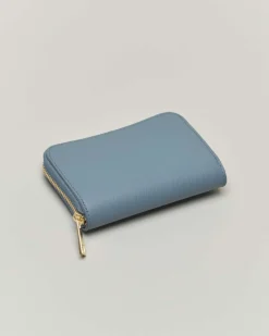 Portafoglio azzurro in pelle martellata con chiusura a cerniera