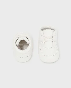 Scarpe panna traforate in ecopelle