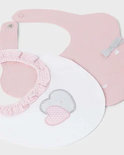 Set con due bavaglini in cotone bianco e rosa con patch di cuori 3 mesi