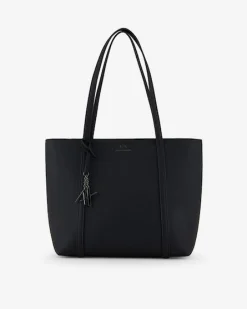 Shopping bag in similpelle martellata con stampa logo grigia sul davanti e charm logo appicato sul manico