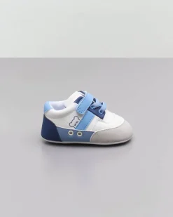 Sneakers bianche blu e azzurre con strappo e lacci