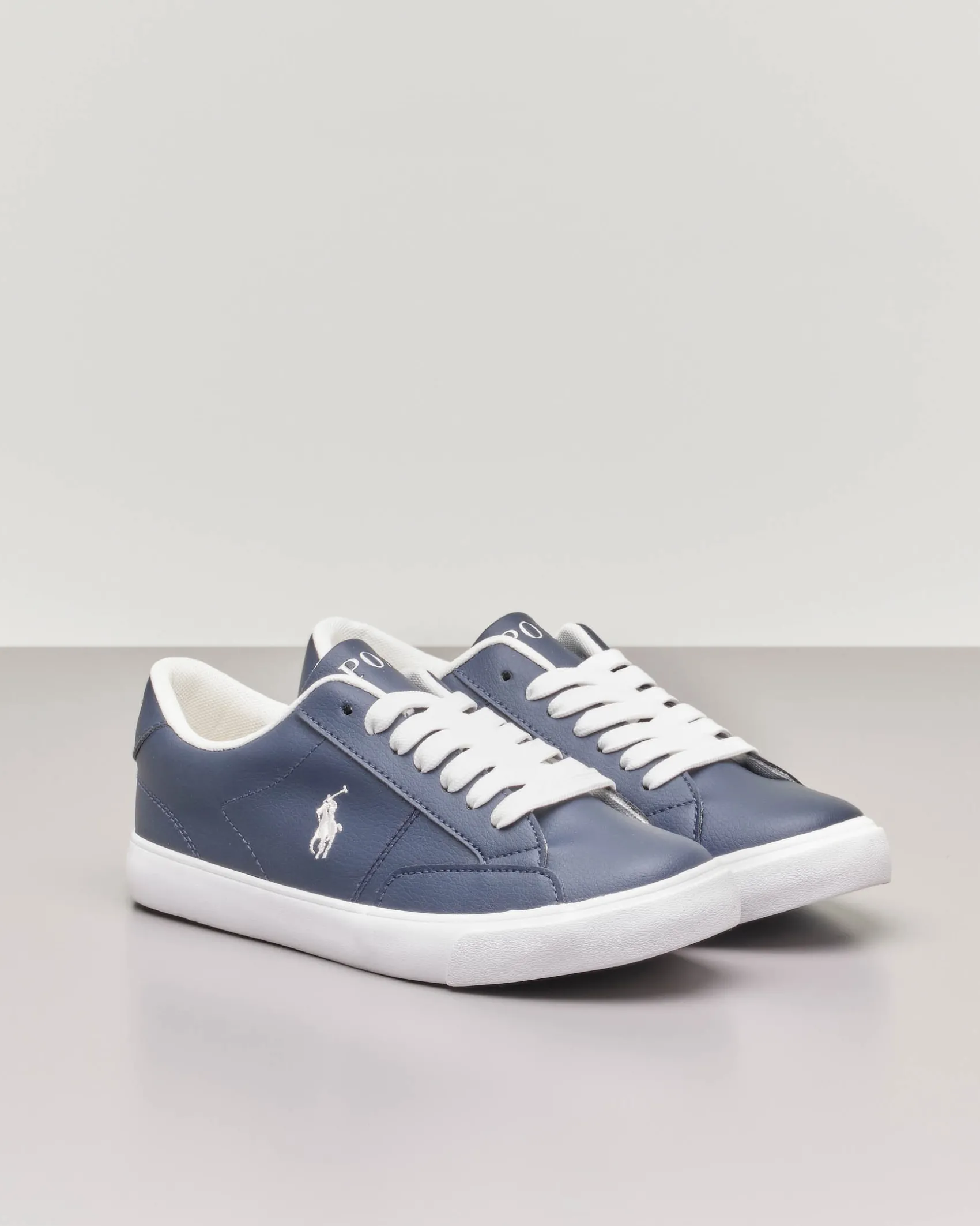 Sneakers blu in ecopelle con pony bianco 35-39