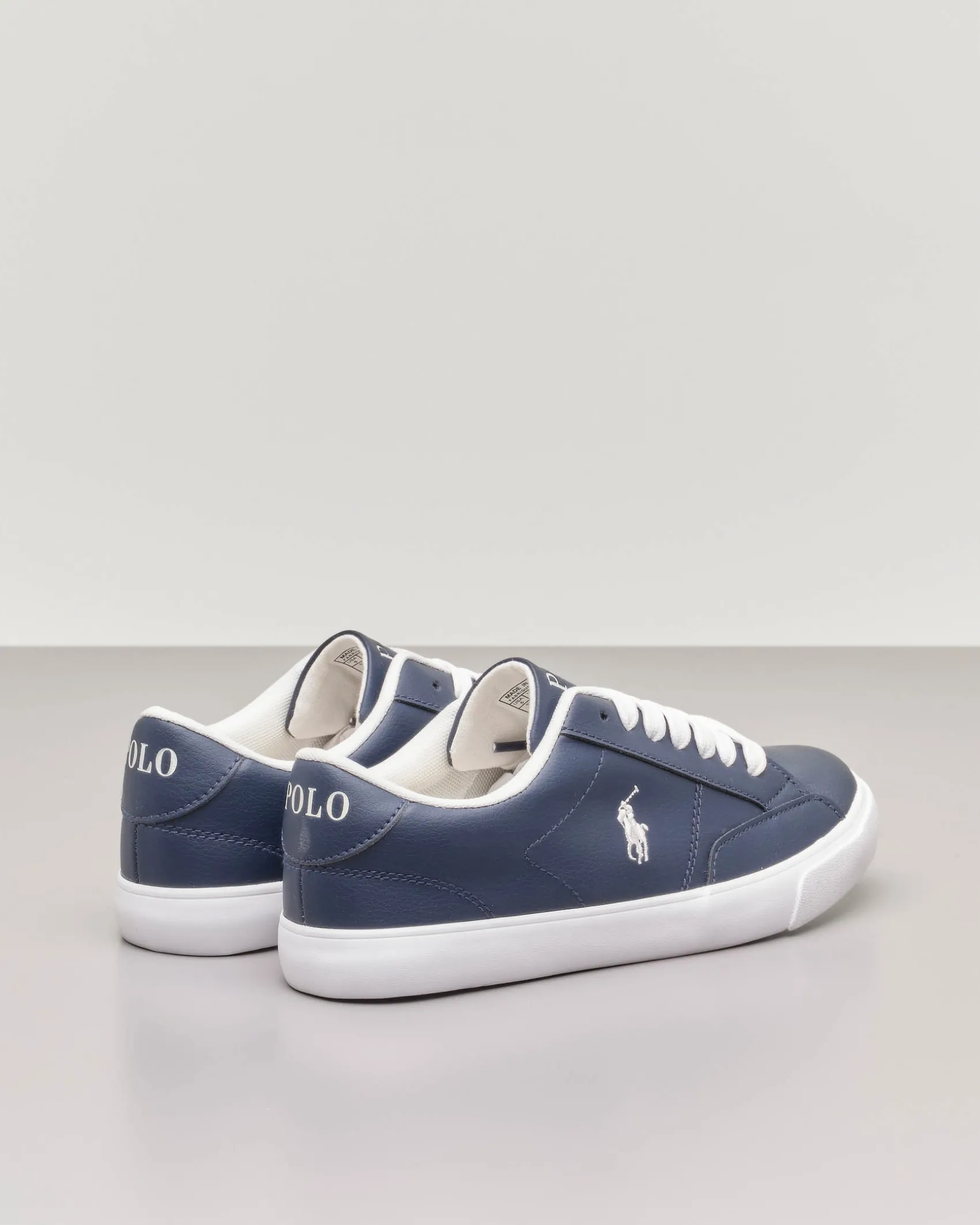 Sneakers blu in ecopelle con pony bianco 35-39