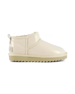 Stivaletto ultra basso beige chiaro in tessuto spalmato effetto lucido con interno in pelo di misto lana