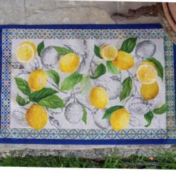 Tappeto Cetara a fantasia limoni e bordo blu 52x80