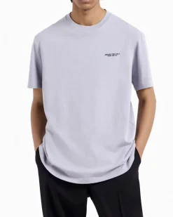 T-shirt mezza manica Armani Exchange lilla tinta unita con logo piccolo stampato sul petto