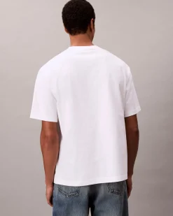 T-shirt relaxed-fit Calvin Klein Jeans bianca in cotone con logo sul petto