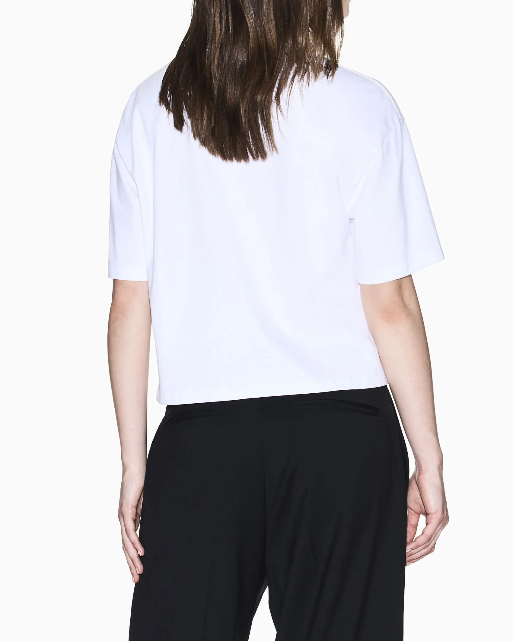 T-shirt Armani Exchange bianca in cotone con logo in strass oro e argento sul davanti