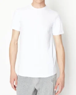 T-shirt bianca a mezza manica tinta unita con logo piccolo ricamato sul petto