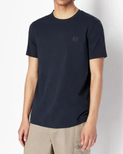 T-shirt blu a mezza manica tinta unita con logo piccolo ricamato sul petto