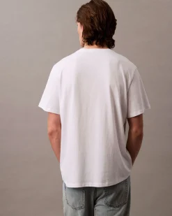 T-shirt Calvin Klein Jeans bianca in cotone con logo monogramma stampato frontale