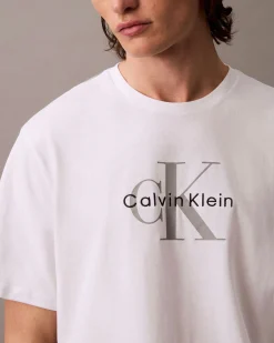 T-shirt Calvin Klein Jeans bianca in cotone con logo monogramma stampato frontale