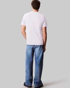 T-shirt Calvin Klein Jeans bianca in cotone con logo ricamato sul petto