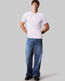 T-shirt Calvin Klein Jeans bianca in cotone con logo ricamato sul petto