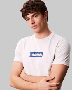 T-shirt Calvin Klein Jeans panna in cotone con stampa logo frontale