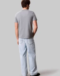 T-shirt Calvin Klein Jeans grigia in cotone con logo scritta sul petto