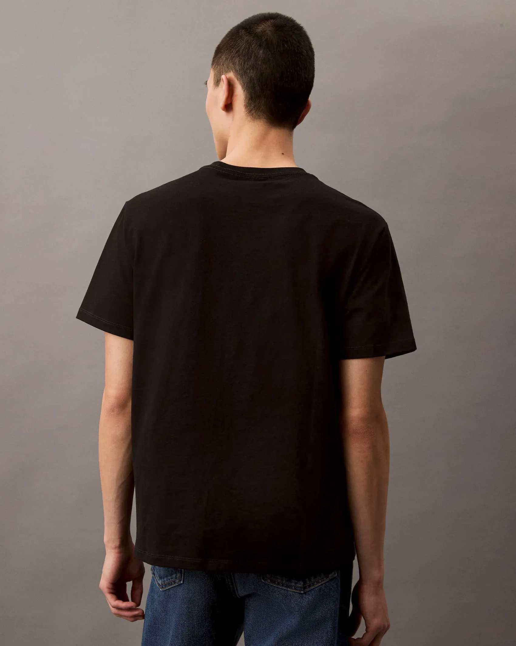 T-shirt Calvin Klein Jeans nera in cotone con logo monogramma stampato frontale