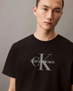T-shirt Calvin Klein Jeans nera in cotone con logo monogramma stampato frontale