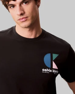 T-shirt Calvin Klein Jeans nera in cotone con logo grafico stampato sul petto