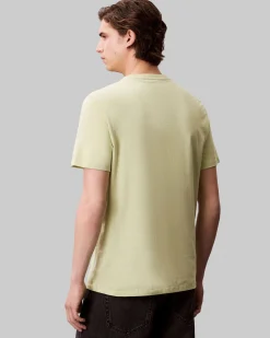 T-shirt Calvin Klein Jeans verde chiaro in cotone con logo ricamato