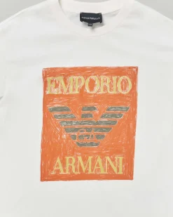 T-shirt Emporio Armani Junior bianca in cotone a maniche corte con maxi stampa logo arancione