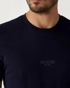 T-shirt Guess blu in cotone con logo in tono ricamato sul petto