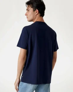T-shirt Guess blu in cotone con logo scritta in rilievo sul petto