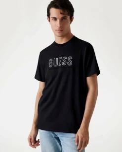 T-shirt Guess nera in cotone con logo scritta in rilievo sul petto