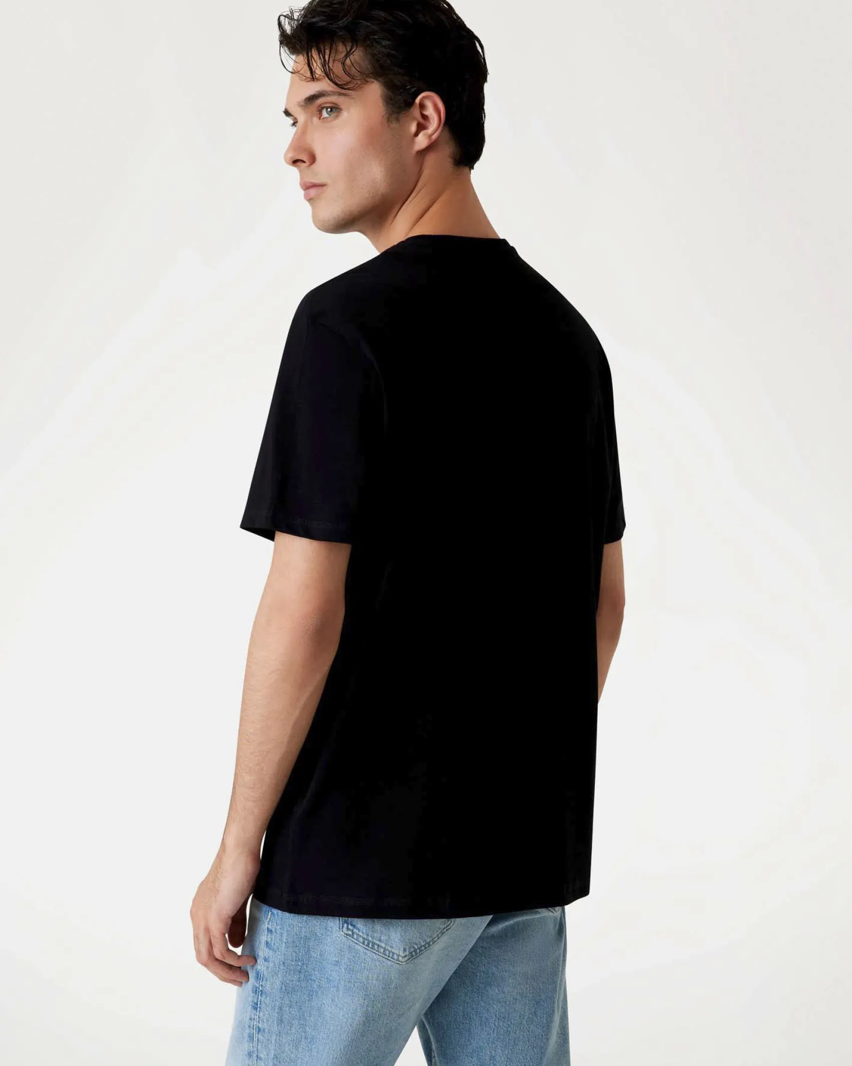 T-shirt Guess nera in cotone con stampa logo triangolo frontale