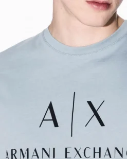T-shirt mezza manica Armani Exchange color acqua in cotone con logo AX stampato in contrasto sul petto