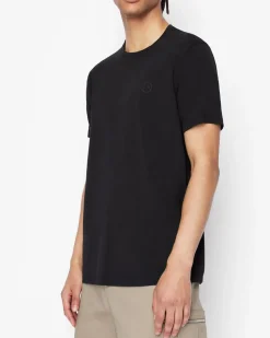 T-shirt nera a mezza manica tinta unita con logo piccolo ricamato sul petto