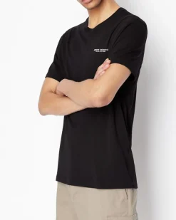 T-shirt nera a mezza manica tinta unita con logo piccolo stampato sul petto