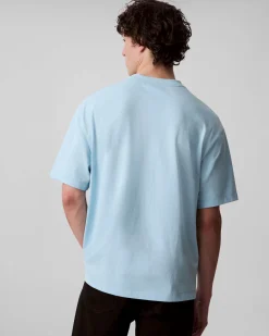 T-shirt relaxed-fit Calvin Klein Jeans azzurra in cotone con logo scritta in rilievo