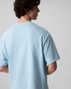T-shirt relaxed-fit Calvin Klein Jeans azzurra in cotone con logo scritta in rilievo