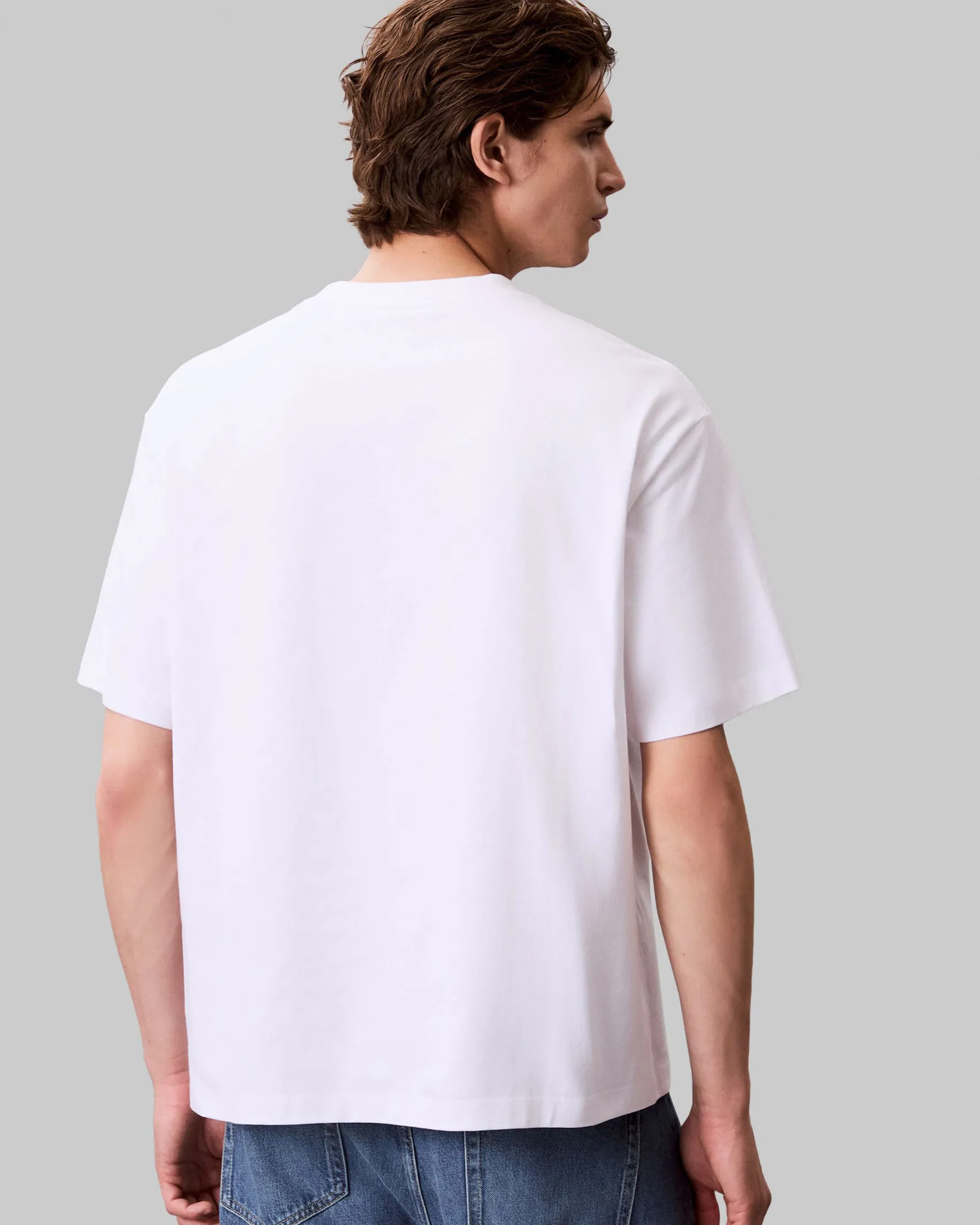 T-shirt relaxed-fit Calvin Klein Jeans bianca in cotone con logo stampato sul petto