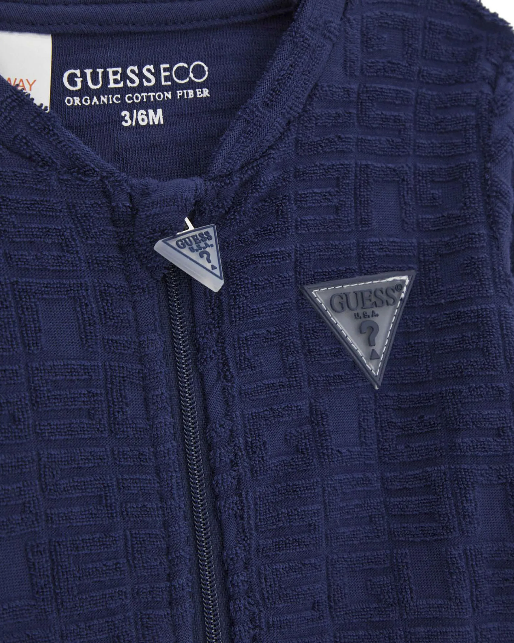 Tuta Guess con body in ciniglia di puro cotone blu e bianco