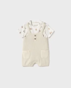 Tutina color panna con salopette a costine e fantasia animaletti