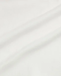 Tutina Ralph Lauren bianca in misto cotone a maniche lunghe con stampa orsetta