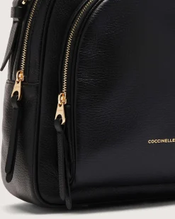Zaino nero Coccinelle Malory Medium in pelle con tasca frontale